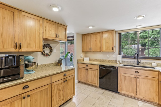 1435 S 263rd Pl, Des Moines, WA 98198 - kitchen with black dishwasher, light tile patterned floors, light stone countertops, and light brown cabinetry