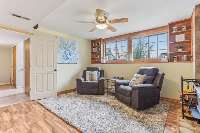 1435 S 263rd Pl, Des Moines, WA 98198 - sitting room featuring ceiling fan and wood finished floors