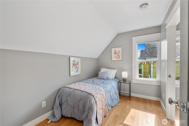 1531 NW 62nd St, Seattle, WA 98107 - bedroom featuring vaulted ceiling and light wood finished floors