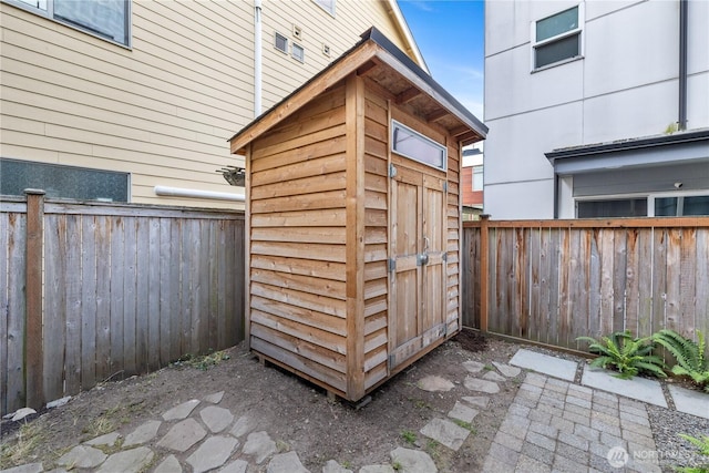 1531 NW 62nd St, Seattle, WA 98107 - view of shed featuring a fenced backyard