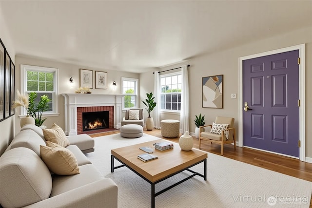 239 S 58th St, Tacoma, WA 98408 - living area featuring wood finished floors and a fireplace