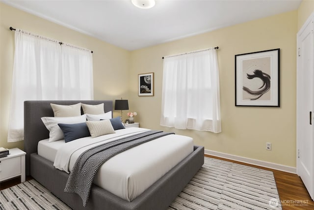 239 S 58th St, Tacoma, WA 98408 - bedroom featuring wood finished floors and baseboards