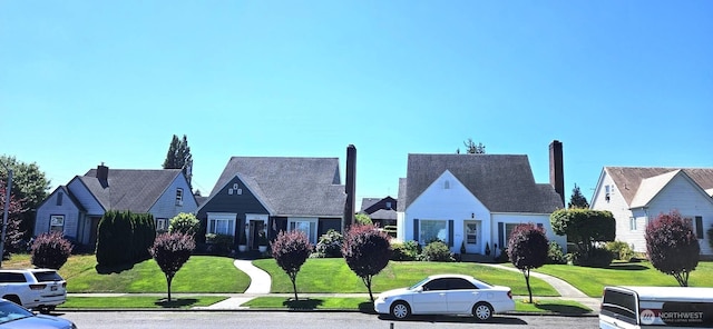 239 S 58th St, Tacoma, WA 98408 - view of front of home featuring a front lawn