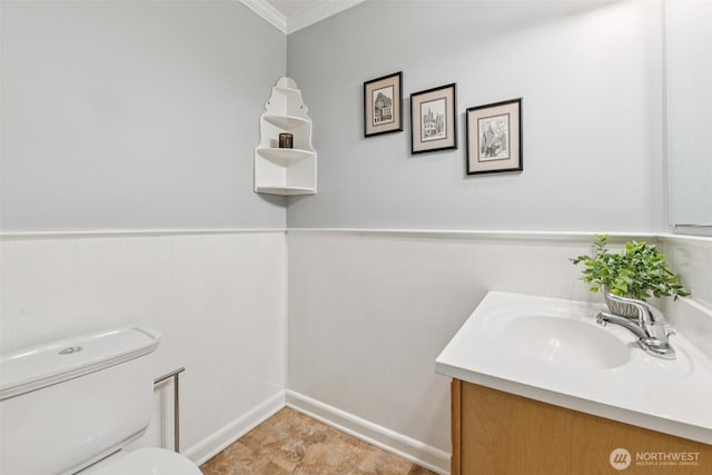13257 4th Ave S, Burien, WA 98168 - half bathroom featuring vanity, ornamental molding, and wainscoting