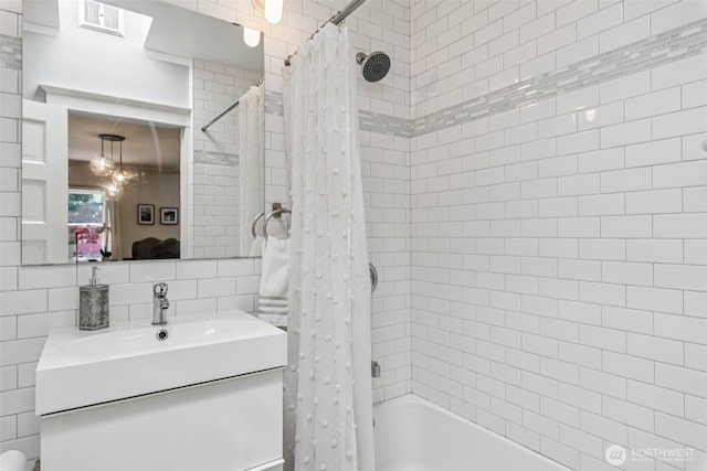 13257 4th Ave S, Burien, WA 98168 - full bath featuring vanity, shower / bath combo with shower curtain, and tile walls