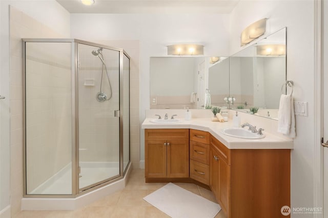 7549 SE 29th St Unit 305, Mercer Island, WA 98040 - bathroom with a shower stall, double vanity, and tile patterned flooring