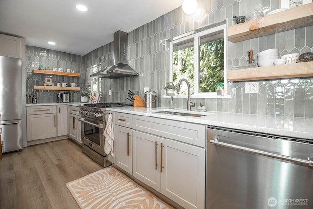 13512 106th Dr SE, Snohomish, WA 98296 - kitchen with open shelves, appliances with stainless steel finishes, decorative backsplash, wall chimney exhaust hood, and recessed lighting