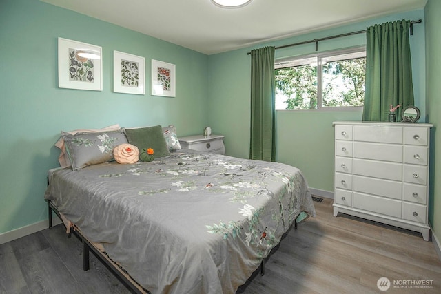 13512 106th Dr SE, Snohomish, WA 98296 - bedroom featuring wood finished floors and baseboards