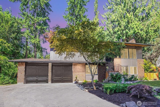 13512 106th Dr SE, Snohomish, WA 98296 - view of front of house with brick siding and asphalt driveway