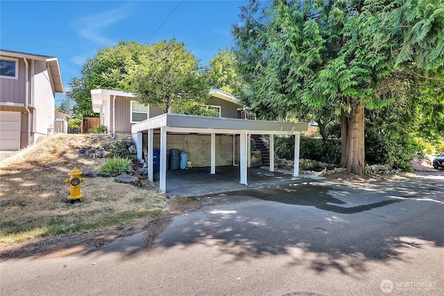 3738 S 189th Pl, Seatac, WA 98188 - view of front of home with stairway and a carport