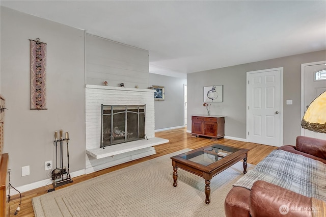 3738 S 189th Pl, Seatac, WA 98188 - living area with light wood-style floors and a fireplace