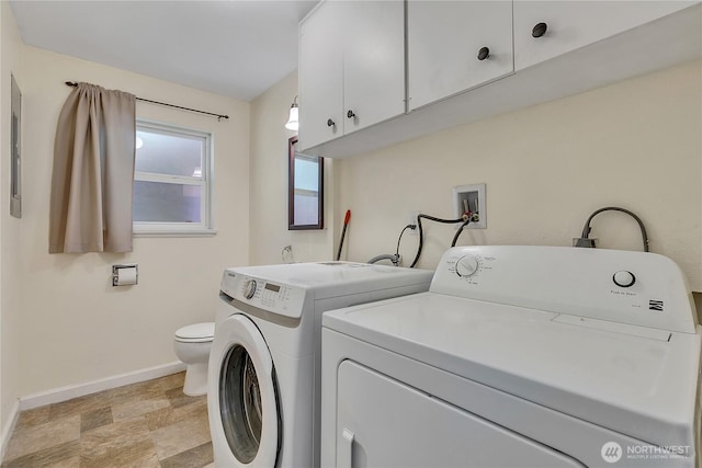 3738 S 189th Pl, Seatac, WA 98188 - washroom featuring washer and dryer and stone finish floors