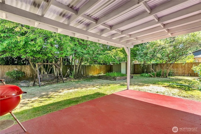 3738 S 189th Pl, Seatac, WA 98188 - fenced backyard featuring a patio area, a grill, and a storage shed