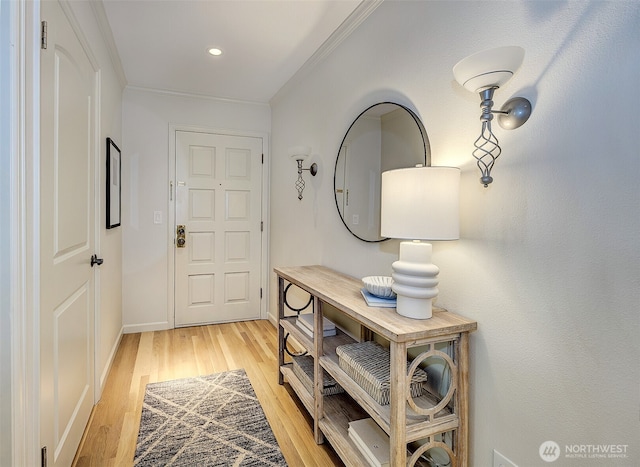 524 Maple St Unit 105, Edmonds, WA 98020 - foyer featuring ornamental molding, light wood-type flooring, and recessed lighting