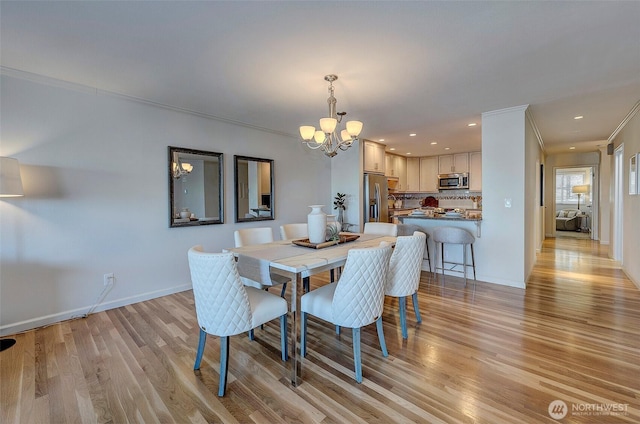 524 Maple St Unit 105, Edmonds, WA 98020 - dining room with a chandelier, light wood-style flooring, ornamental molding, and recessed lighting
