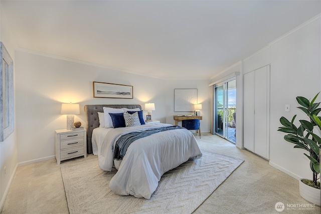 524 Maple St Unit 105, Edmonds, WA 98020 - bedroom with light carpet, access to outside, and crown molding