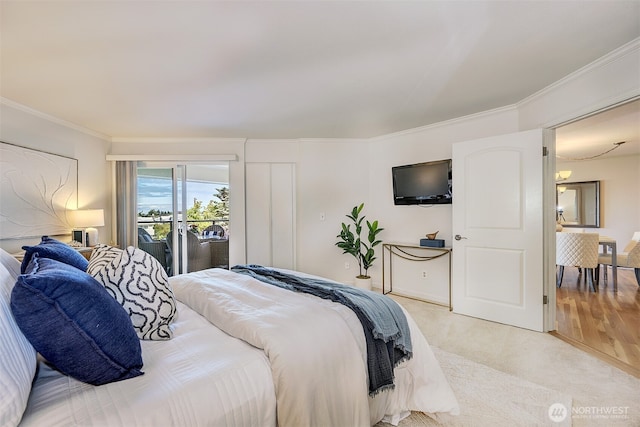 524 Maple St Unit 105, Edmonds, WA 98020 - bedroom with access to outside, crown molding, and light carpet