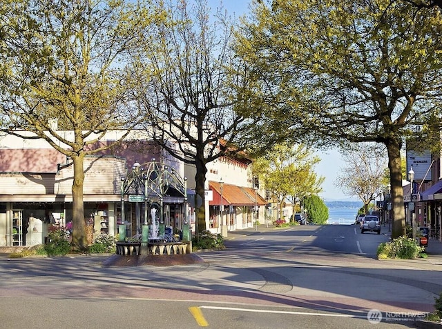 524 Maple St Unit 105, Edmonds, WA 98020 - view of asphalt street with curbs, sidewalks, and a water view