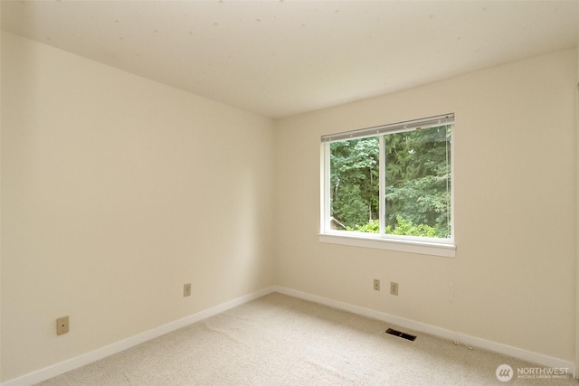 14626 58th Dr SE, Everett, WA 98208 - empty room with baseboards and light colored carpet
