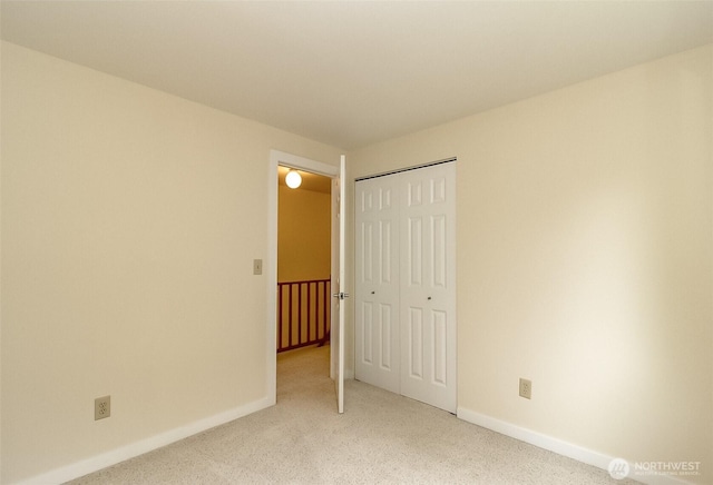 14626 58th Dr SE, Everett, WA 98208 - unfurnished bedroom featuring light carpet and a closet