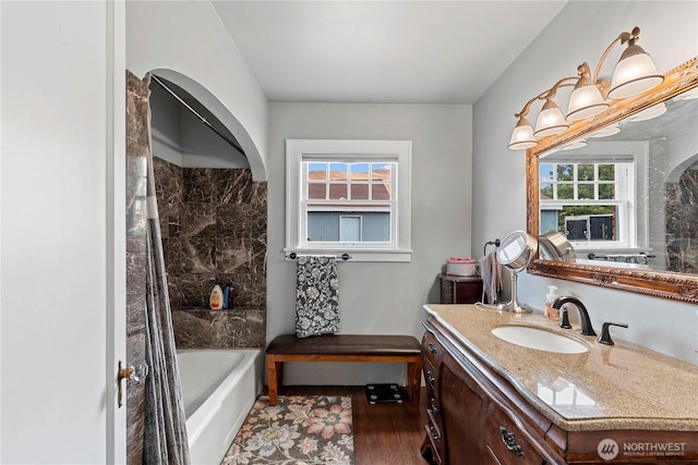 2020 Easy St, Wenatchee, WA 98801 - full bath with vanity, wood finished floors, and washtub / shower combination