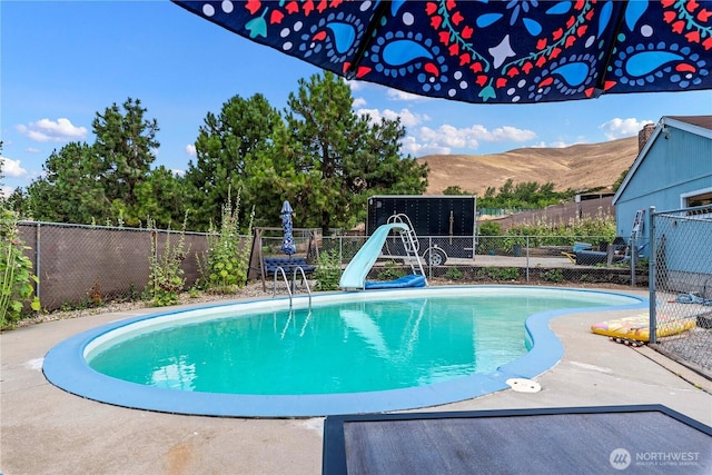 2020 Easy St, Wenatchee, WA 98801 - view of pool with a water slide and a mountain view