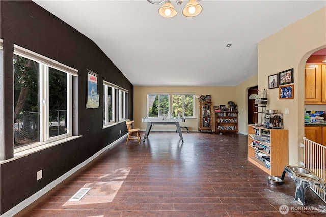 2020 Easy St, Wenatchee, WA 98801 - interior space with vaulted ceiling, arched walkways, and wood finished floors