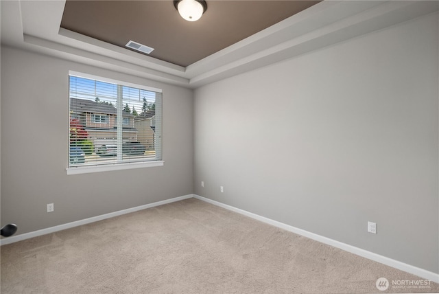 535 Beechwood Ct SW, Olympia, WA 98502 - spare room featuring carpet floors and a raised ceiling