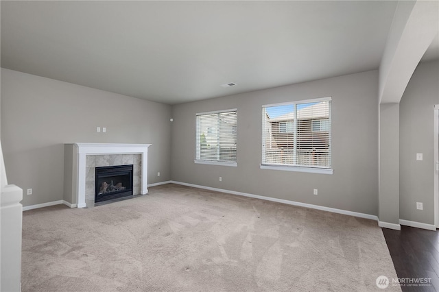 535 Beechwood Ct SW, Olympia, WA 98502 - unfurnished living room featuring a fireplace and carpet