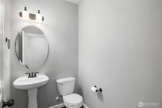 535 Beechwood Ct SW, Olympia, WA 98502 - bathroom with toilet and baseboards