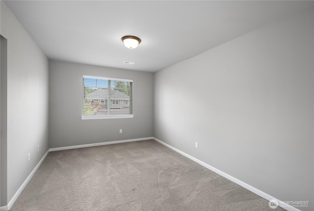 535 Beechwood Ct SW, Olympia, WA 98502 - carpeted empty room featuring baseboards