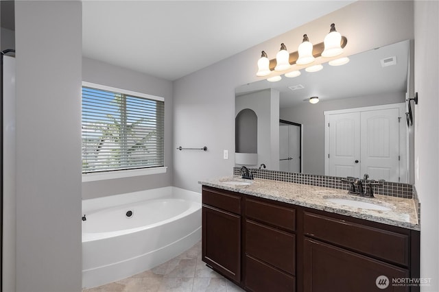 535 Beechwood Ct SW, Olympia, WA 98502 - full bathroom with a bath, double vanity, and an enclosed shower