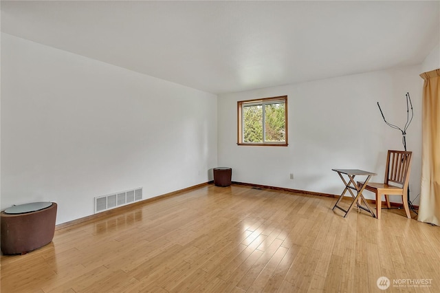 11022 SE 313th St, Auburn, WA 98092 - unfurnished room with light wood finished floors and baseboards