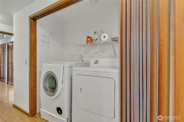 11022 SE 313th St, Auburn, WA 98092 - washroom featuring separate washer and dryer and light wood-style floors