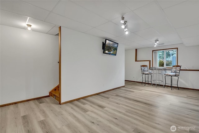 11022 SE 313th St, Auburn, WA 98092 - below grade area with a paneled ceiling and wood finished floors