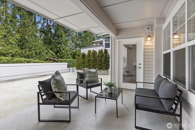 8500 Main St Unit F205, Edmonds, WA 98026 - view of patio featuring an outdoor hangout area