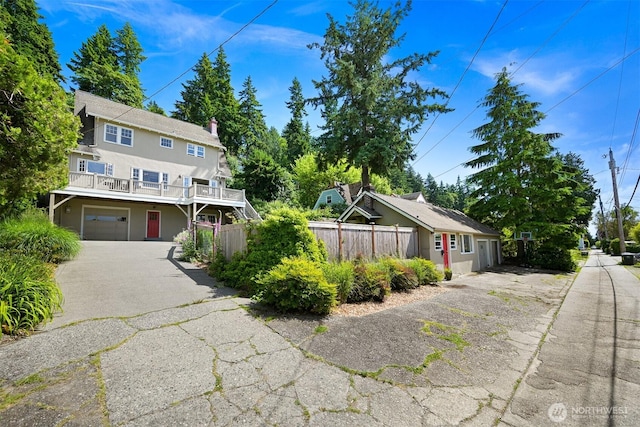 251 N Garden St, Bellingham, WA 98225 - view of front of home featuring driveway, an attached garage, and a deck