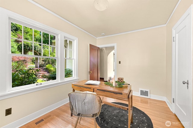 251 N Garden St, Bellingham, WA 98225 - office area featuring healthy amount of natural light, ornamental molding, light wood-style floors, and arched walkways