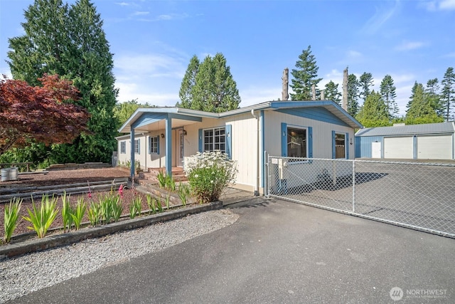 8265 Skeena Way, Blaine, WA 98230 - view of front of house with an outbuilding and a porch