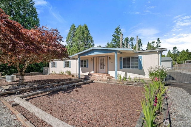 8265 Skeena Way, Blaine, WA 98230 - single story home featuring a porch and an outdoor structure