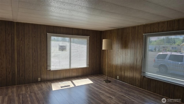 511 Leisure Cir, Aberdeen, WA 98520 - unfurnished room with wood finished floors and wooden walls