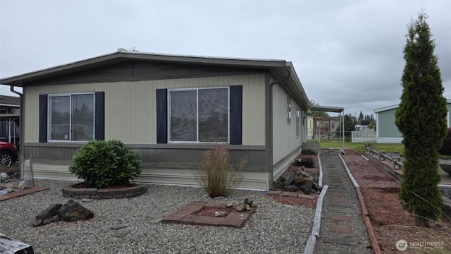 511 Leisure Cir, Aberdeen, WA 98520 - view of property exterior with a vegetable garden