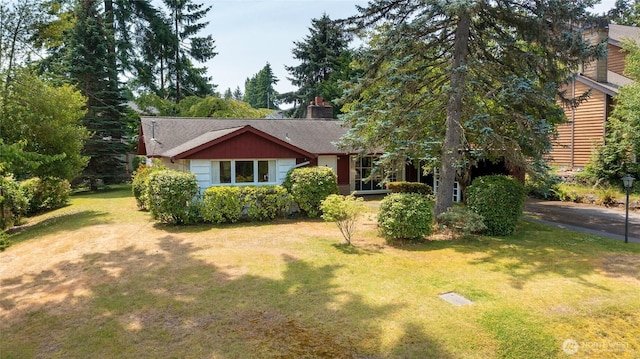 10629 NE 26th St, Bellevue, WA 98004 - view of front of house featuring a front lawn, a chimney, and roof with shingles
