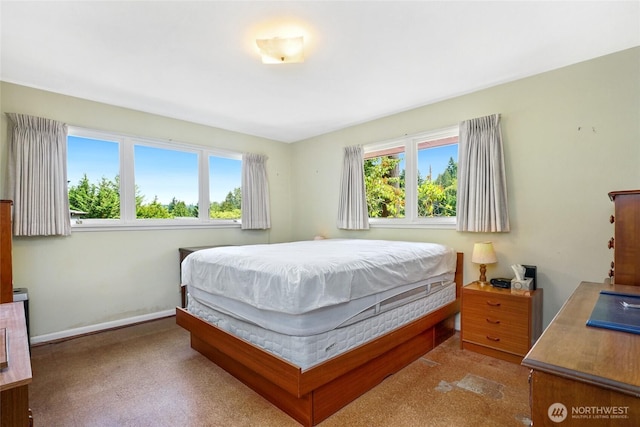 10629 NE 26th St, Bellevue, WA 98004 - bedroom featuring baseboards and carpet floors