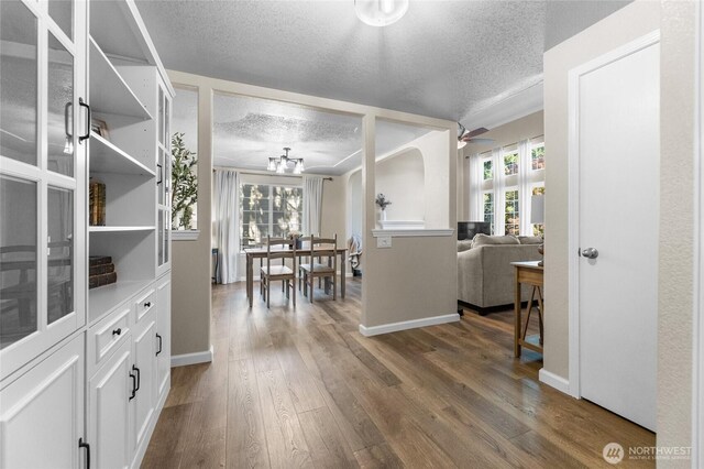 7605 38th Ct SE, Lacey, WA 98503 - interior space with a textured ceiling, wood finished floors, plenty of natural light, and ceiling fan