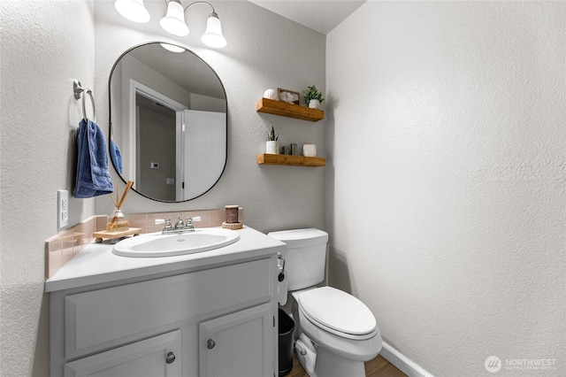 7605 38th Ct SE, Lacey, WA 98503 - bathroom with vanity and a textured wall