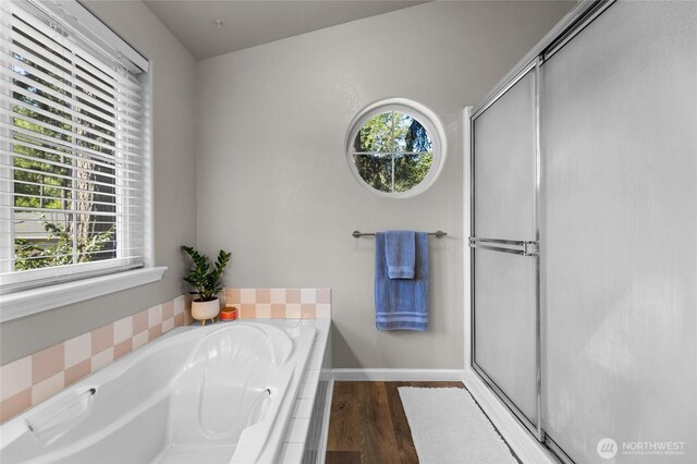 7605 38th Ct SE, Lacey, WA 98503 - bathroom with healthy amount of natural light, a stall shower, and a bath