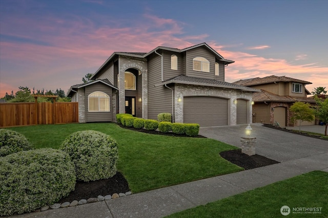 4212 145th Pl SE, Snohomish, WA 98296 - traditional home featuring concrete driveway, a garage, and brick siding