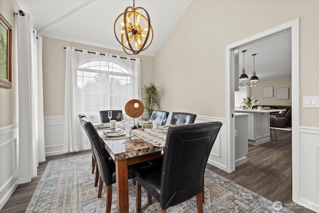 4212 145th Pl SE, Snohomish, WA 98296 - dining space with a chandelier, wainscoting, dark wood finished floors, lofted ceiling, and a decorative wall