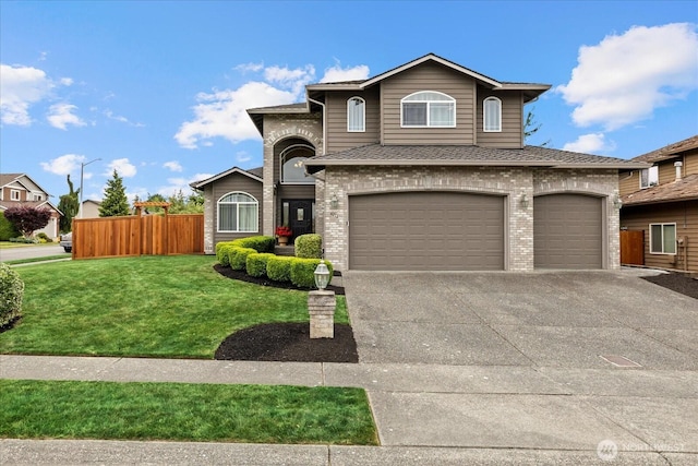 4212 145th Pl SE, Snohomish, WA 98296 - traditional home with brick siding, driveway, an attached garage, and a shingled roof